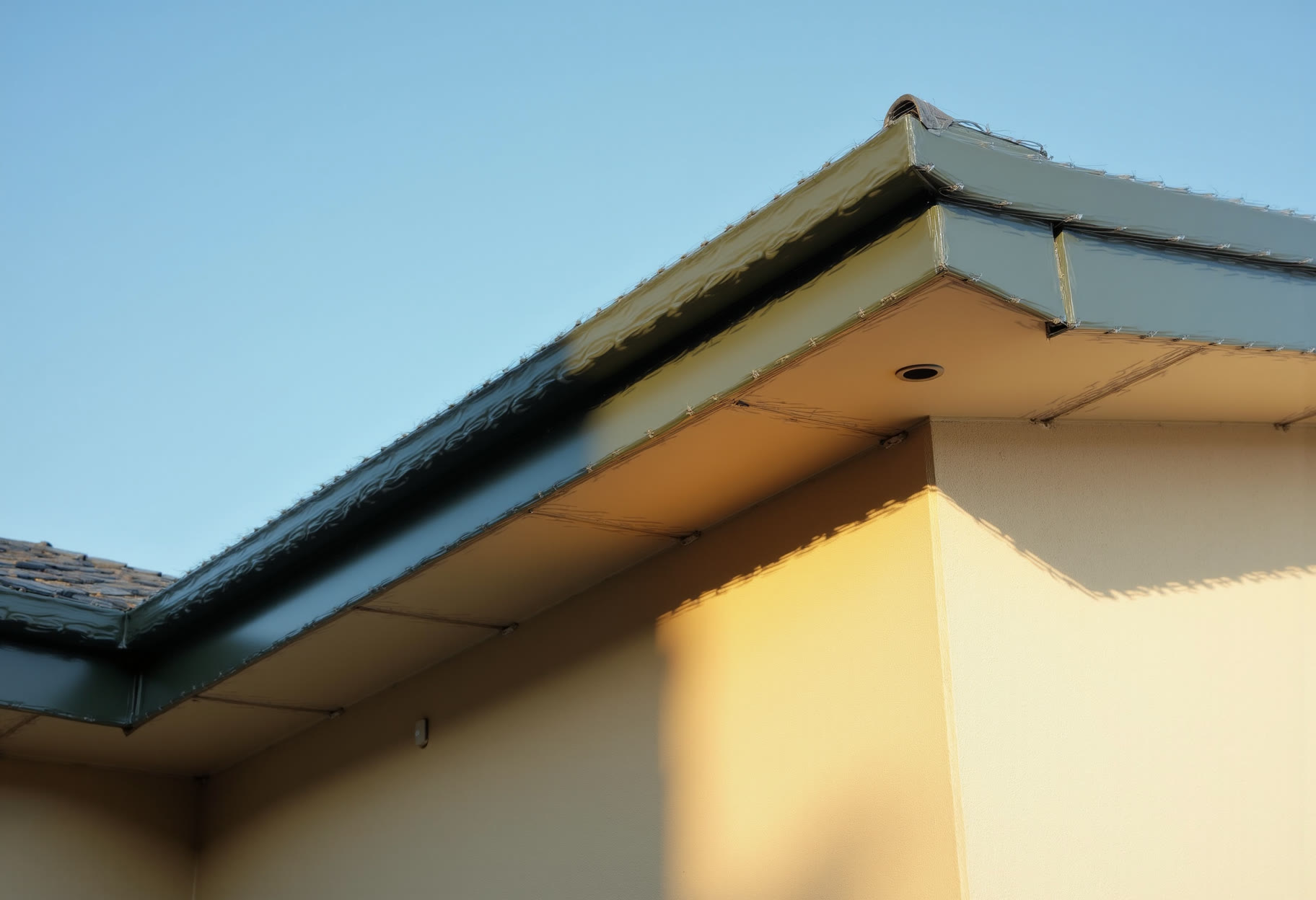 Vented soffit and wrapped fascia